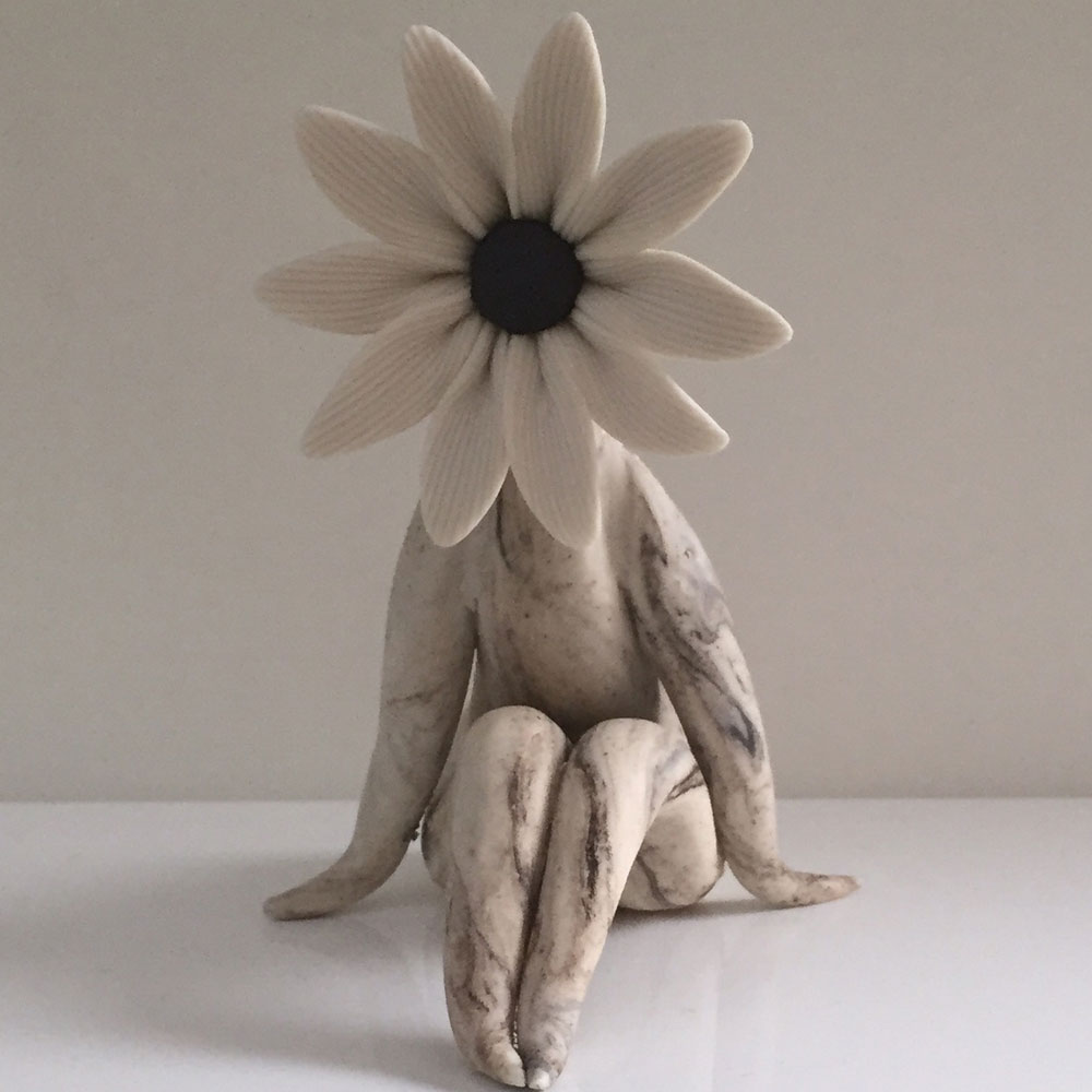 lady daisy flower sculpture